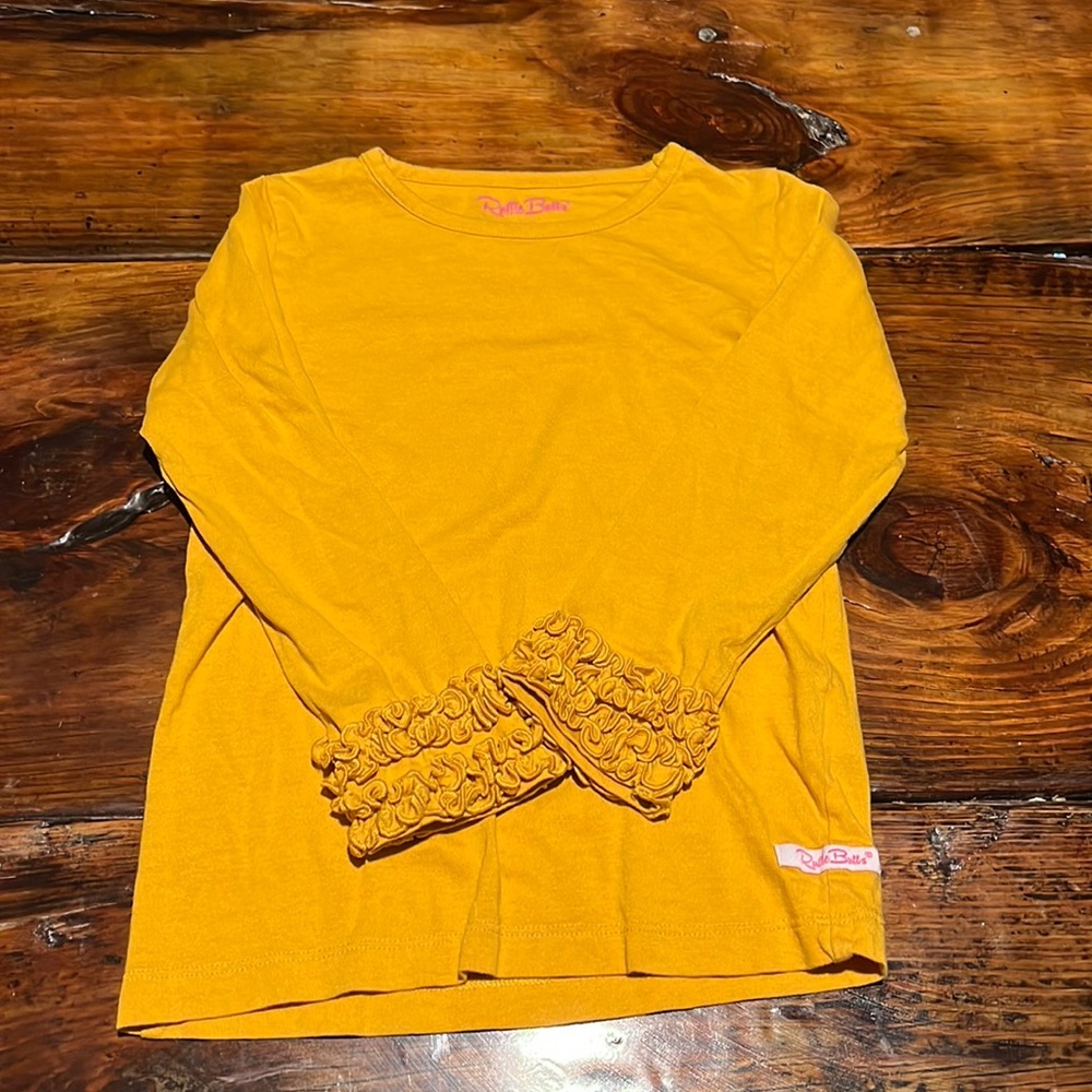 Ruffle Butts long sleeve ruffle sleeve mustard shirt
